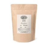 Beige packaging of Anima Mundi herbs with a label on a white background